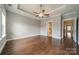 Spacious main bedroom with hardwood floors, ceiling fan, and lots of light at 2305 Blueberry St, Belmont, NC 28012