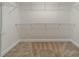 Walk-in closet with wire shelving and neutral carpet at 2305 Blueberry St, Belmont, NC 28012