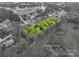 Aerial view showcasing property lines on a wooded lot perfect for building a dream home at 2474 Cedar Valley Dr, Conover, NC 28613