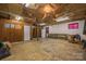 Unfinished basement space with concrete floors, exposed ceiling, and potential for customization at 2474 Cedar Valley Dr, Conover, NC 28613