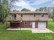 View of deck, garage and backyard at 2474 Cedar Valley Dr, Conover, NC 28613
