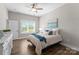 Cozy bedroom with natural light and a ceiling fan at 249 Landing Trl, Mount Gilead, NC 27306