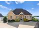 Charming home with a well-manicured lawn, beautiful landscaping, and a convenient circular driveway at 249 Landing Trl, Mount Gilead, NC 27306