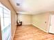 Living room featuring laminate floors and natural light at 3032 Mallard Forest Dr, Charlotte, NC 28269