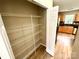 Walk-in pantry with wire shelving provides lots of storage space near the kitchen at 3032 Mallard Forest Dr, Charlotte, NC 28269