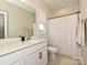 Well-lit bathroom features a combination tub/shower with stylish vanity and modern fixtures at 306 Cloudcroft Aly, Charlotte, NC 28217