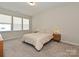 Bedroom with natural light with side tables and lamps at 306 Cloudcroft Aly, Charlotte, NC 28217