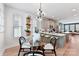 Open dining area with modern decor adjacent to a bright kitchen at 316 S Turner Ave # 11, Charlotte, NC 28208