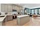 Modern kitchen featuring stainless steel appliances, a central island, and an open floor plan at 316 S Turner Ave # 11, Charlotte, NC 28208