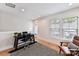 Bright home office with a desk, natural light, and a stylish black and white striped rug at 316 S Turner Ave # 11, Charlotte, NC 28208