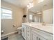 Bathroom with dual sinks, vanity, and a large mirror at 3205 Berry Creek Rd, Charlotte, NC 28214