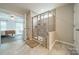 Bathroom featuring a glass-enclosed shower with gray tile at 3205 Berry Creek Rd, Charlotte, NC 28214