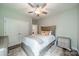 Bedroom featuring a bed, neutral walls, and closet space at 3205 Berry Creek Rd, Charlotte, NC 28214