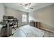 Home office space with a desk, chair, and natural light from the window at 3205 Berry Creek Rd, Charlotte, NC 28214