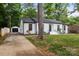 Inviting single-Gathering home with landscaped front yard and detached garage in a tranquil setting at 3538 Denson Pl, Charlotte, NC 28215