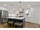 Beautiful kitchen featuring a large island and stainless steel appliances at 3538 Denson Pl, Charlotte, NC 28215
