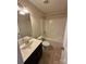 Bathroom featuring a combined shower and tub, plus a vanity with ample counter space at 4048 Avis Way, Monroe, NC 28110