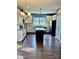 Modern kitchen with central island, stainless steel appliances, and ample cabinet space at 4048 Avis Way, Monroe, NC 28110