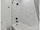 Modern bathroom featuring gray geometric tile in the shower and a soaking tub at 4135 Mineral Ln, Lincolnton, NC 28092