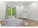 Bright bedroom with a window that offers a serene view, and a light-colored dresser at 4135 Mineral Ln, Lincolnton, NC 28092