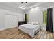 Bright bedroom with wood floors, double closets and natural light at 4135 Mineral Ln, Lincolnton, NC 28092
