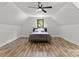 Spacious bedroom with hardwood floors, a ceiling fan, and natural light at 4135 Mineral Ln, Lincolnton, NC 28092