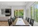 Open dining area with natural light, a view of the outdoors, and access to a covered patio at 4135 Mineral Ln, Lincolnton, NC 28092