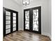 Stylish entryway featuring hardwood floors and modern double doors at 4135 Mineral Ln, Lincolnton, NC 28092