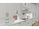 Bright kitchen featuring custom cabinets, modern appliances, and sleek countertops at 4135 Mineral Ln, Lincolnton, NC 28092