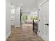 Bright, open-concept living room with hardwood floors and natural light at 4135 Mineral Ln, Lincolnton, NC 28092