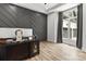 Bright home office featuring a herringbone wall and a large window with natural light at 4135 Mineral Ln, Lincolnton, NC 28092