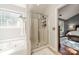 Bright bathroom with a jacuzzi tub and separate shower, connected to the main bedroom at 4201 Beauvista Dr, Charlotte, NC 28269