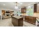 Kitchen with granite countertops, stainless steel appliances, and view to living room at 4201 Beauvista Dr, Charlotte, NC 28269