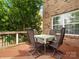 Cozy back deck with outdoor seating, perfect for relaxation and entertaining near brick home at 422 Deer Brush Ln, Waxhaw, NC 28173