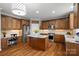 Spacious kitchen with stainless steel appliances, granite countertops, and custom cabinetry at 422 Deer Brush Ln, Waxhaw, NC 28173