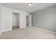 Bedroom with neutral carpet, fresh paint, doorway, and closet at 423 Shallowford Dr, Rock Hill, SC 29732