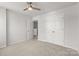 Bedroom with carpet, ceiling fan, closet, and doorway at 423 Shallowford Dr, Rock Hill, SC 29732