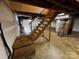Basement with staircase and concrete flooring at 5068 King Wilkinson Rd, Denver, NC 28037