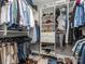Spacious walk-in closet with custom shelving, hanging racks, and ample storage space at 5130 Mount Clare Ln, Charlotte, NC 28210