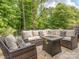 Outdoor living space featuring comfortable seating and a gas firepit at 5130 Mount Clare Ln, Charlotte, NC 28210