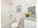 Bathroom featuring tub-shower combination and modern granite countertop vanity at 514 Rich St, Rock Hill, SC 29730