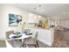 Cozy dining area adjacent to kitchen, featuring a round table and contemporary artwork at 514 Rich St, Rock Hill, SC 29730
