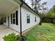 Charming white home exterior with black shutters and well-maintained landscaping at 514 Rich St, Rock Hill, SC 29730