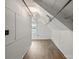 Finished attic space with wood floors, white walls, and exposed duct work at 514 W Sumter St, Shelby, NC 28150