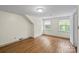 Sunny bedroom showcases hardwood floors and plenty of light, offering a versatile space at 514 W Sumter St, Shelby, NC 28150