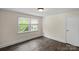 Bedroom with neutral walls and a double window bringing in natural light at 514 W Sumter St, Shelby, NC 28150