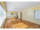Cozy sunroom with natural light and hardwood floors, providing a relaxing atmosphere at 514 W Sumter St, Shelby, NC 28150