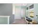 Upstairs hallway with natural light, neutral paint, and carpet flooring at 518 Dutch White Dr, Clover, SC 29710