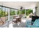 Covered porch with a ceiling fan, outdoor furniture, and natural sunlight throughout at 518 Dutch White Dr, Clover, SC 29710