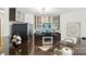 Contemporary kitchen with stainless steel appliances, granite countertops, and plentiful storage at 529 N Graham St # 3F, Charlotte, NC 28202